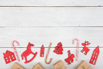 Vintage christmas decoration on wooden table - Xmas tree, houses