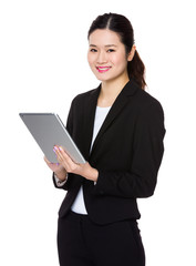 Asian Young Businesswoman use of the tablet pc