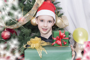 Christmas boy holding a present 