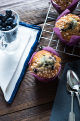 Homemade blueberry muffin on wooden rustic table