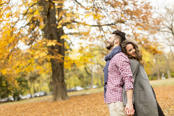 Young couple in the autumn park
