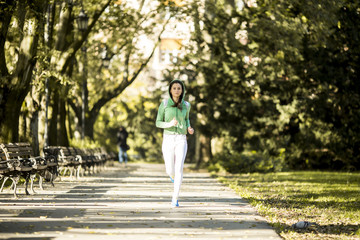 Young woman running in the park