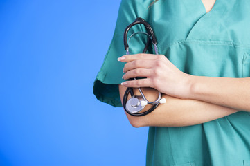 Medical blue background doctor with a stethoscope