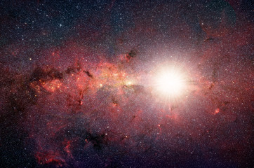 Fototapeta na wymiar Bright, shining star in the background galaxy. Elements of this image furnished by NASA