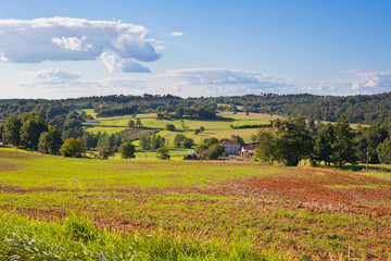 Rural landscape with a Farm and a fileld