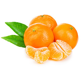 Ripe mandarin with green leaves close-up on a white background.