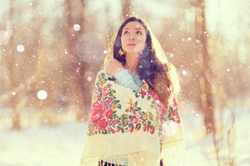 beautiful model in a traditional Russian scarf winter