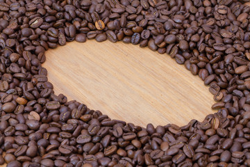 Coffee beans on the wooden table