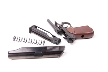 Disassembled gun, isolated