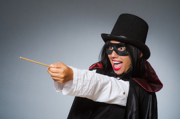 Obraz premium Woman magician in funny concept