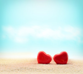 Two hearts on the summer beach