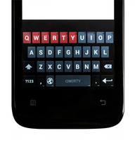 Obraz premium Smartphone. Qwerty keyboard touch screen smartphone on an isolated white background. Vertical orientation image.
