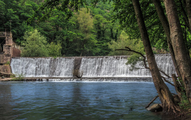 Fototapeta na wymiar Abandoned dam in forest