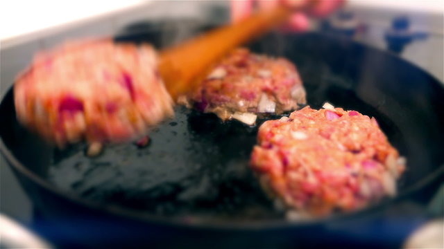 Frying and Flipping a Burger Patty