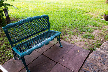 Empty chair in the garden