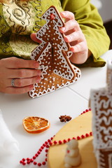 Decorating gingerbread cookies.