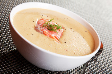 Avocado cream soup with salmon