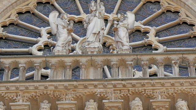 The images carved on the wall of the Notre Dame Cathedral. These are images of man and other saints 