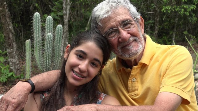Grandfather and Granddaughter with Cactus
