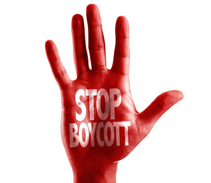 Stop Boycott written on hand isolated on white background