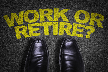 Top View of Business Shoes on the floor with the text: Work or Retire?