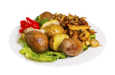 potato baked with greens on the plate, isolated