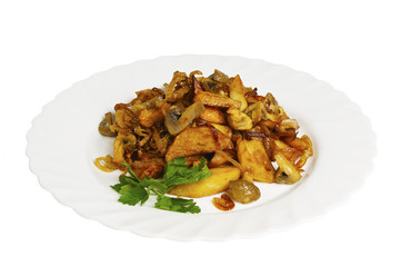 Potato, fried with mushrooms and onions on the plate, isolated