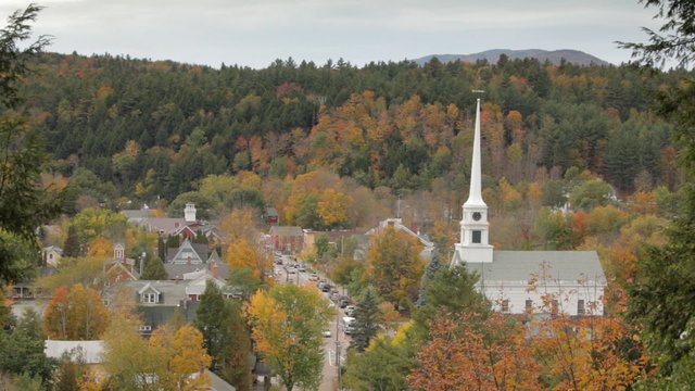Main street of Stowe, Vermont, USA in Autumn, including its landmark church, from above.