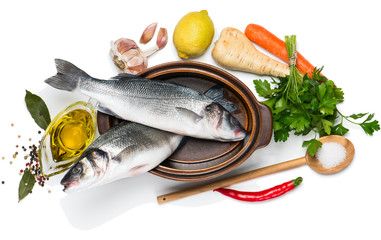 Preparing to cook sea bass fishes, view from above