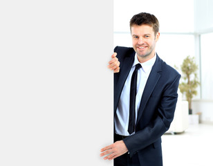 Businessman demonstrates the project to the potential customer and smiling