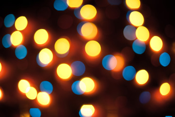 Defocused christmas lights. New Year bokeh. Abstract background