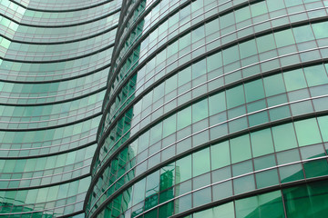 Obraz premium Reflections in Glass Building