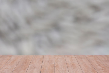 Wood table top on color abstract blurred background. ready for product display