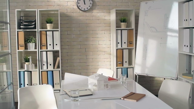 Architectural project on table in empty office