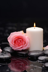 rose with candle and therapy stones 