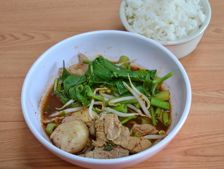 pork ball in brown soup eat with rice