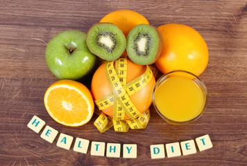 Fresh fruits, juice and tape measure, healthy lifestyles and nutrition