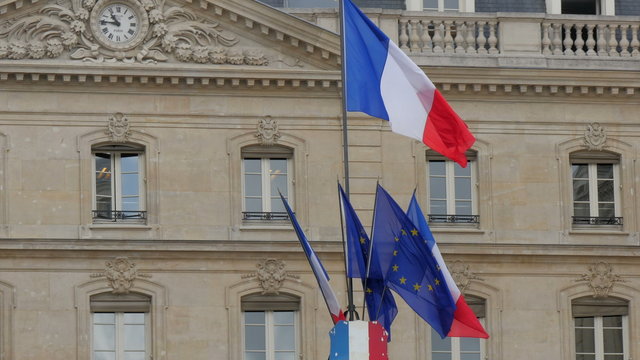 Set of flag of France waving on the pole. Waving on the breeze of the wind in Paris