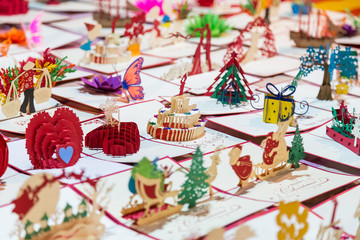 Paper souvenirs and postcards with holiday  wishes