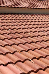 brown tile roof weathered on building residential