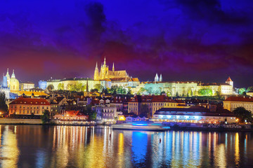 Fototapeta na wymiar View of Prague Castle famous historic bridge that crosses the Vl
