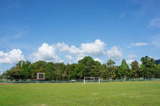 football field with blue sky