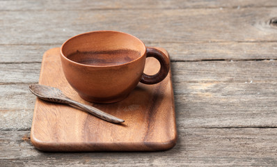 Wooden tea cup on table wood