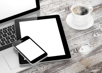 Laptop, phone, tablet pc and coffee.