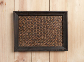 Fototapeta premium square wood tray on table wood, top view