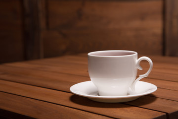 A cup of tea on the wooden table