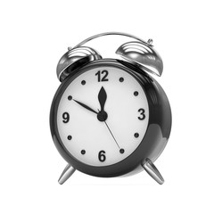 Black alarm clock on white