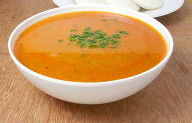 Sambar, a south Indian vegetarian dish, garnished with coriander leaves.