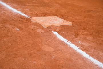 baseball and base on baseball field