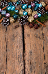 Christmas decoration, balls on dark wooden background 